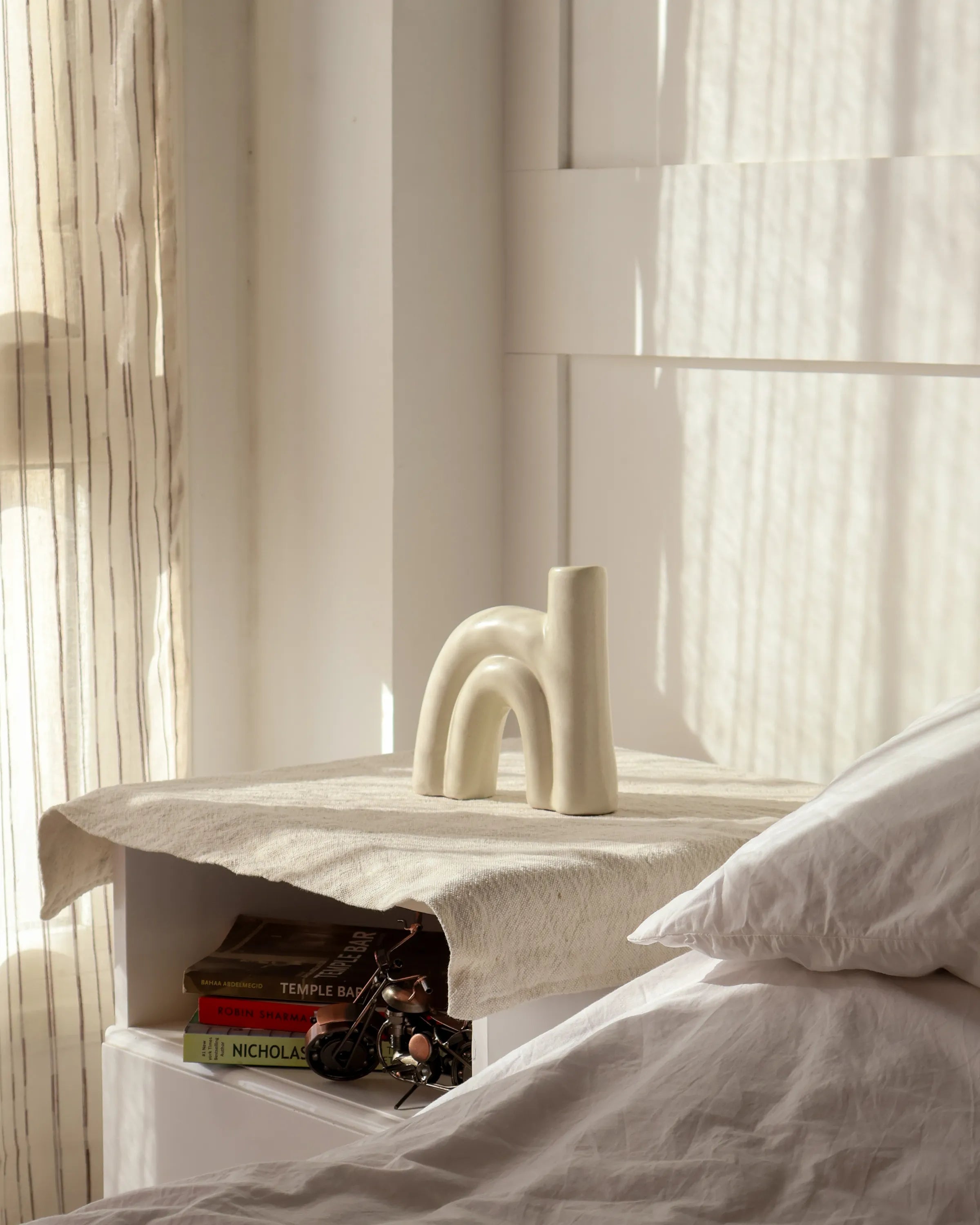 Handcrafted Arcus decor piece in off white finish by Stonia.