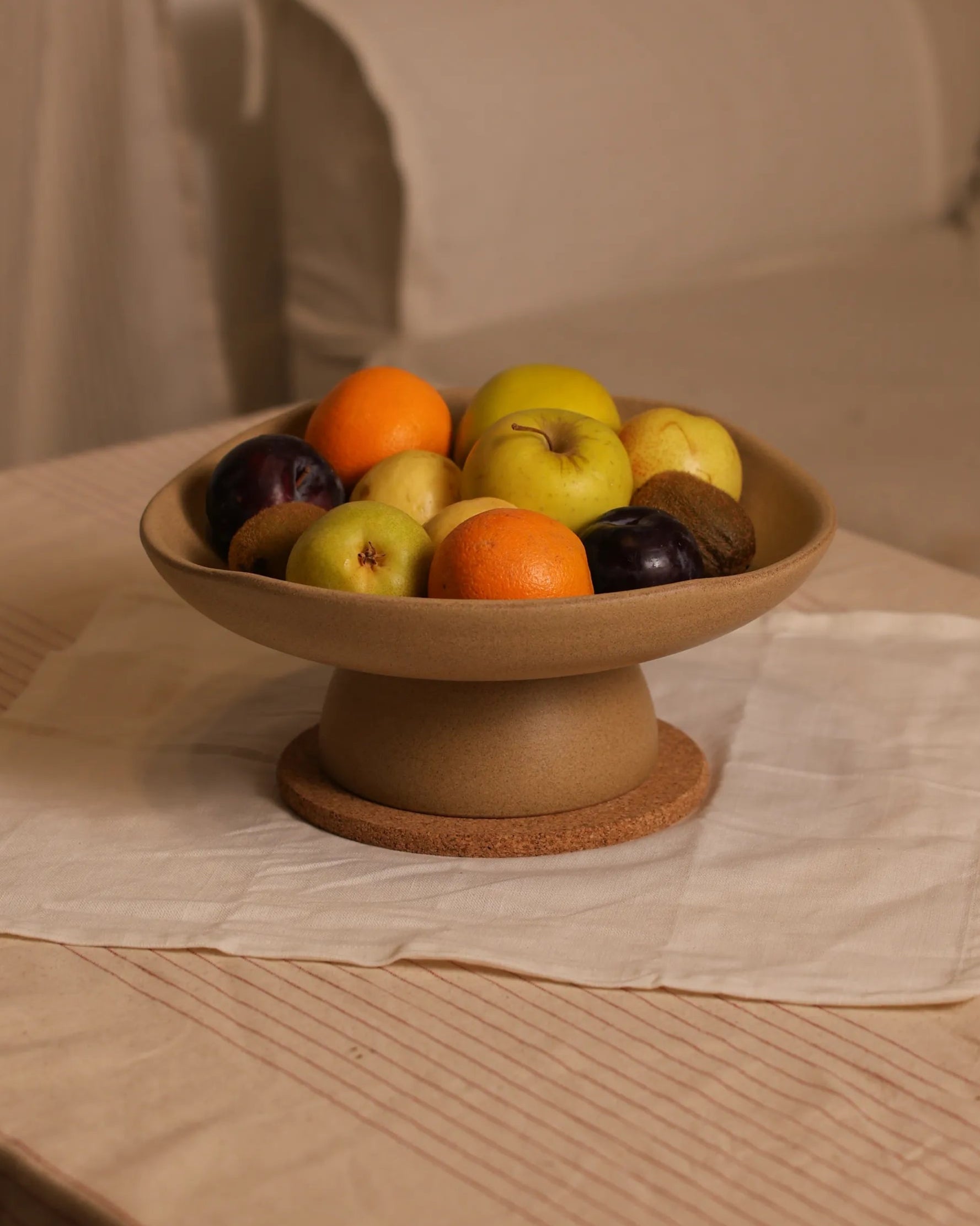 Handcrafted CALMA serving plate in beige finish by Stonia.
