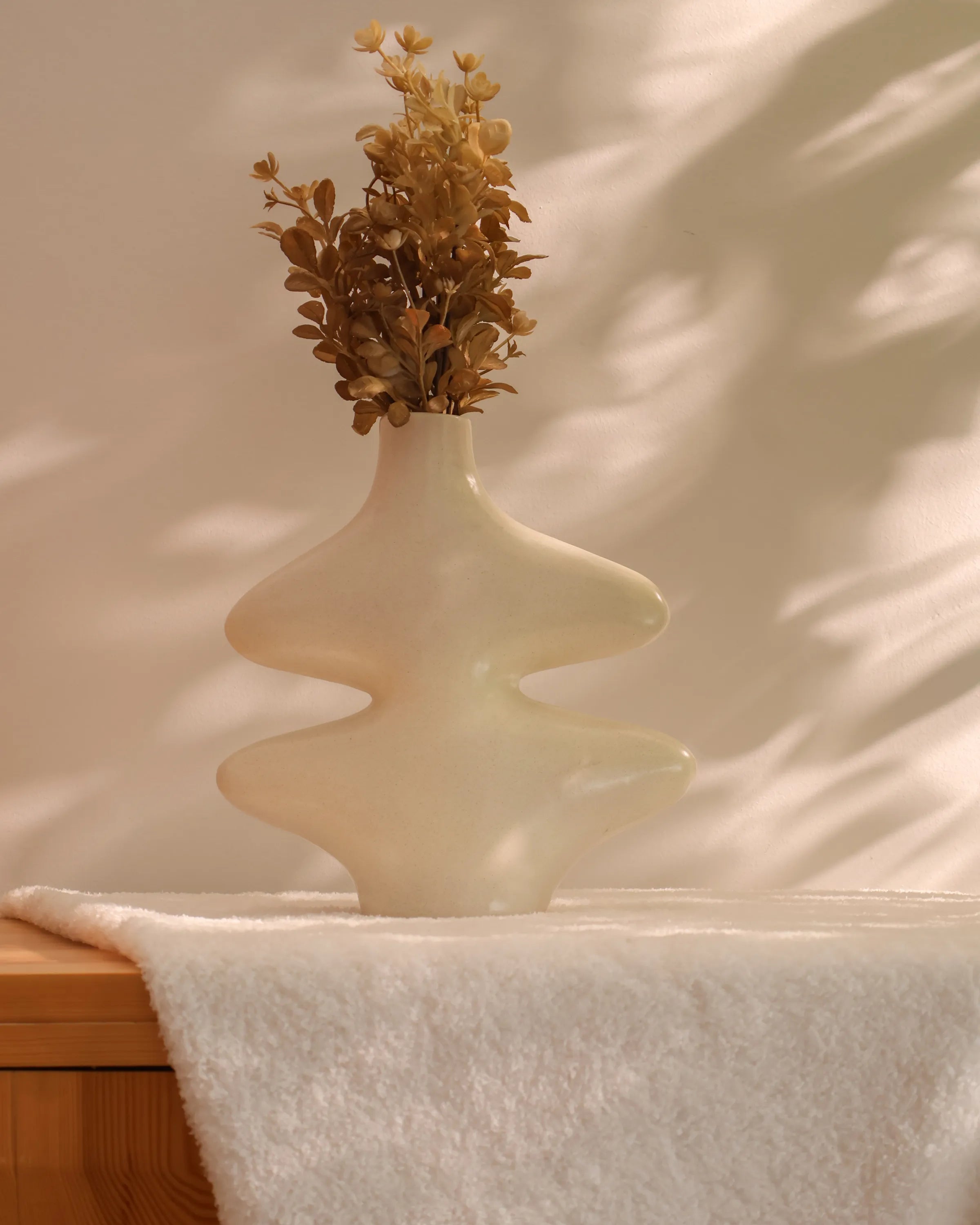 Handcrafted Curvy vase decor piece in off white finish by Stonia.