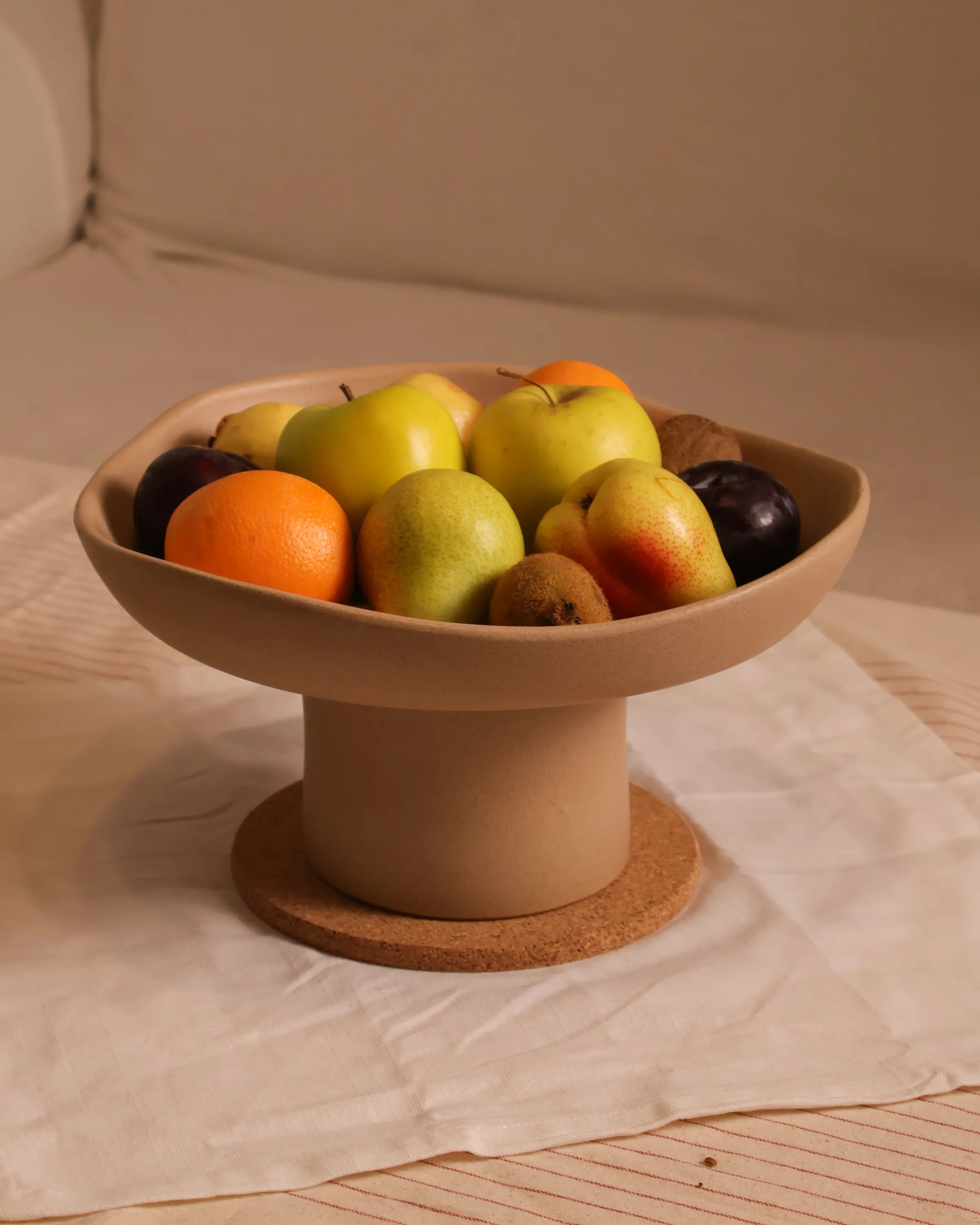 Handcrafted FLORA serving plate in beige finish by Stonia.