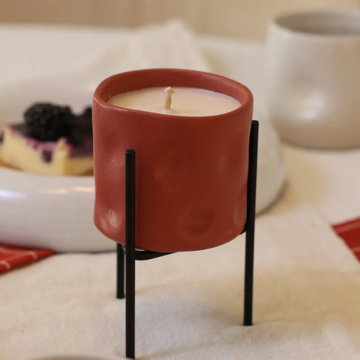 Handcrafted Melty Candle in terracotta finish by Stonia.