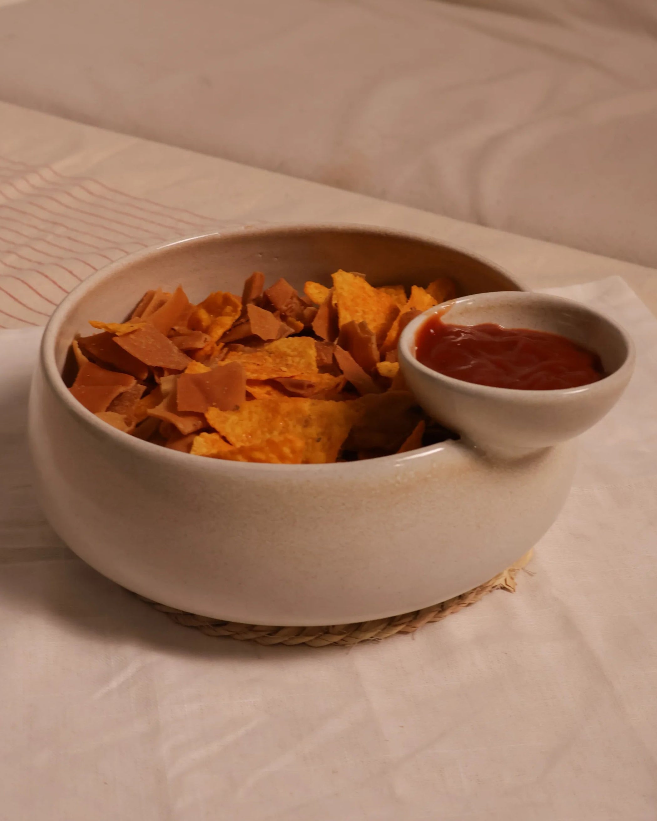 Handcrafted NEST serving plate in light beige finish by Stonia.