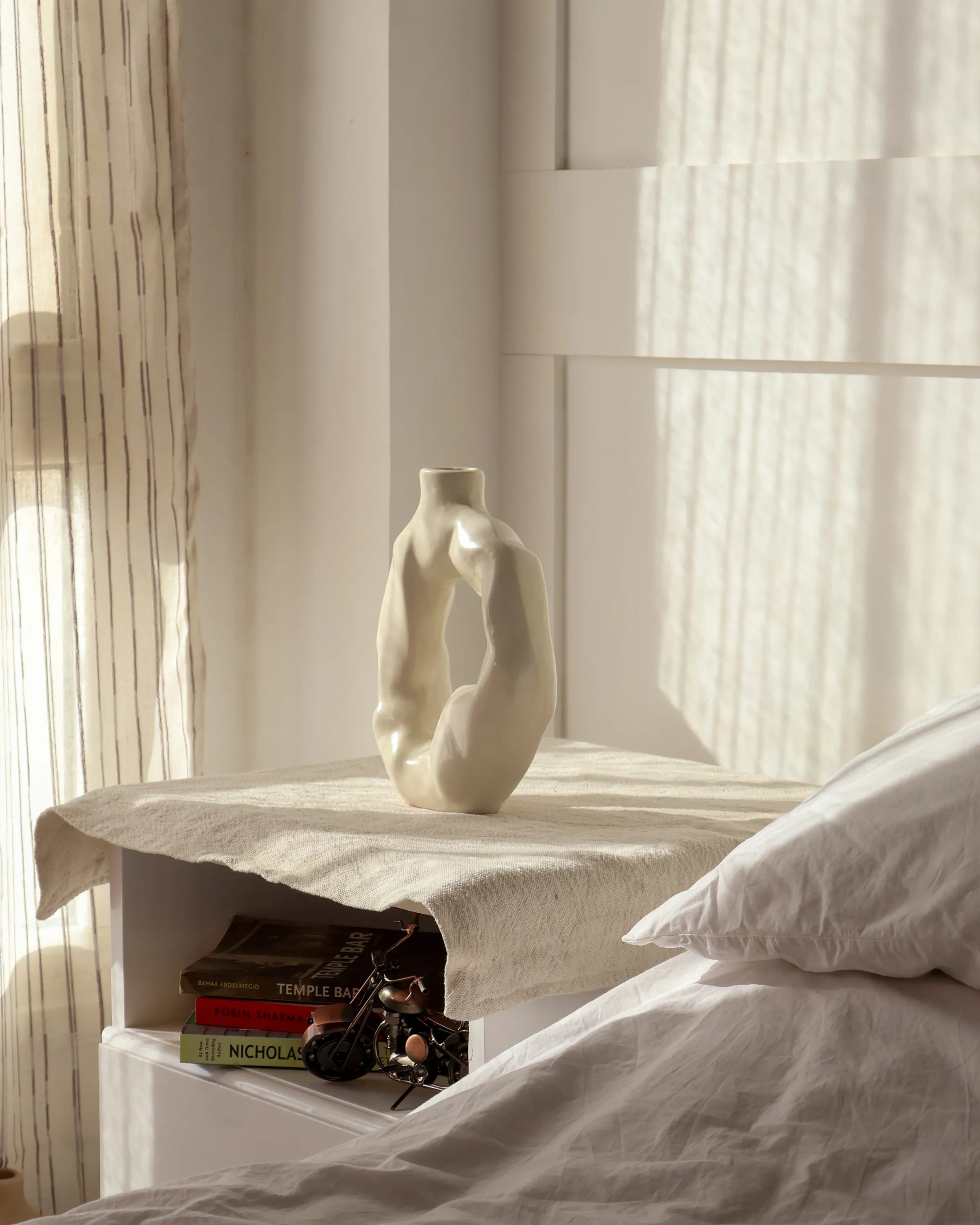 Handcrafted Ora decor piece in off white finish by Stonia.