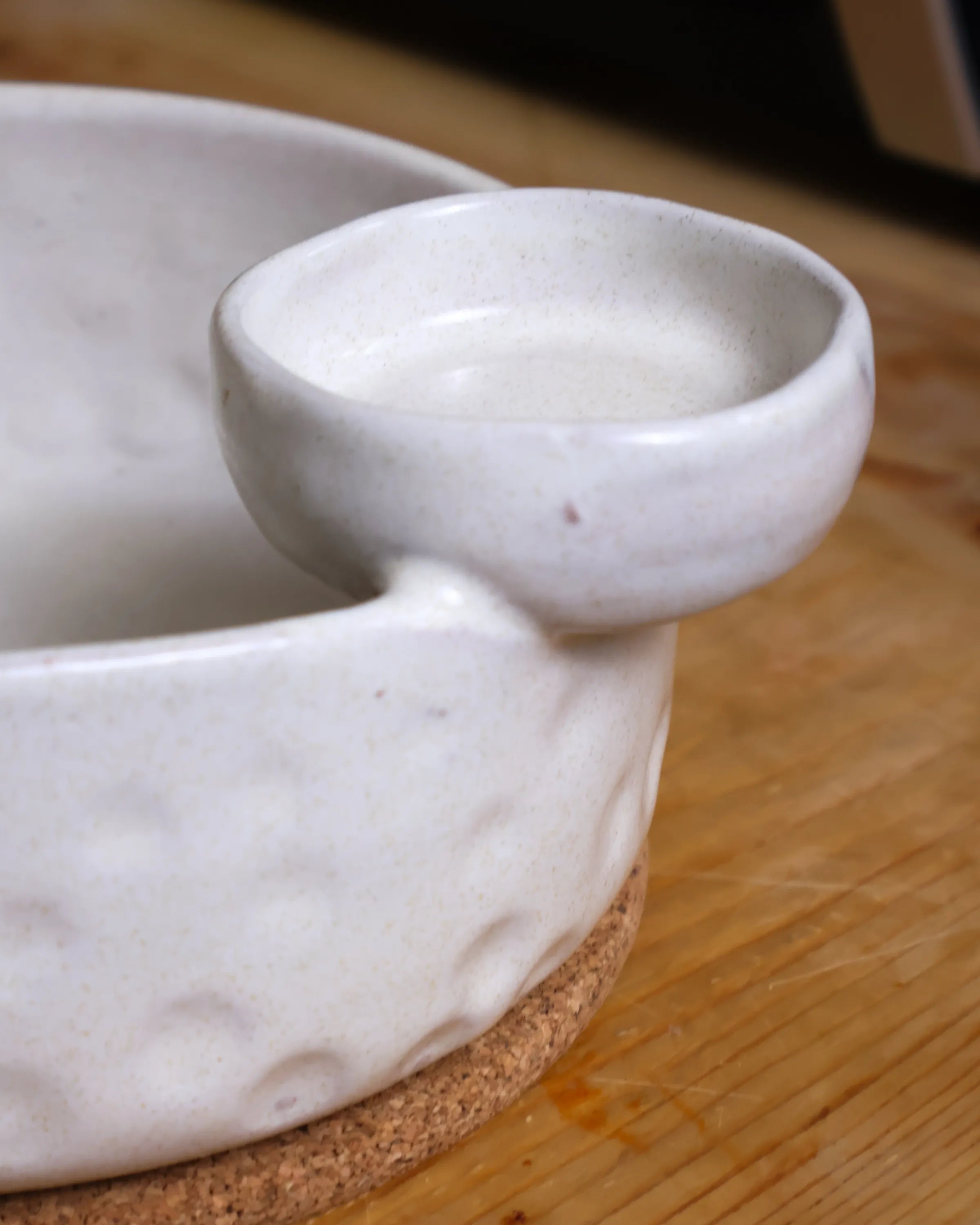 Handcrafted Saucy Bowl serving plate in off white finish by Stonia.