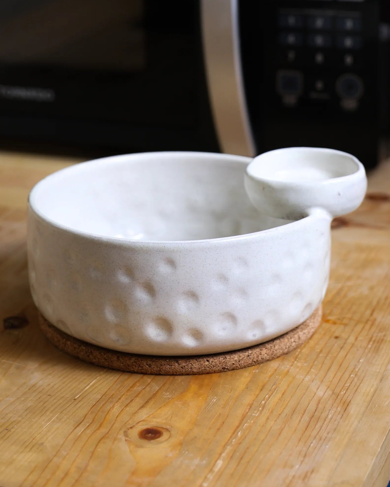 Handcrafted Saucy Bowl serving plate in off white finish by Stonia.