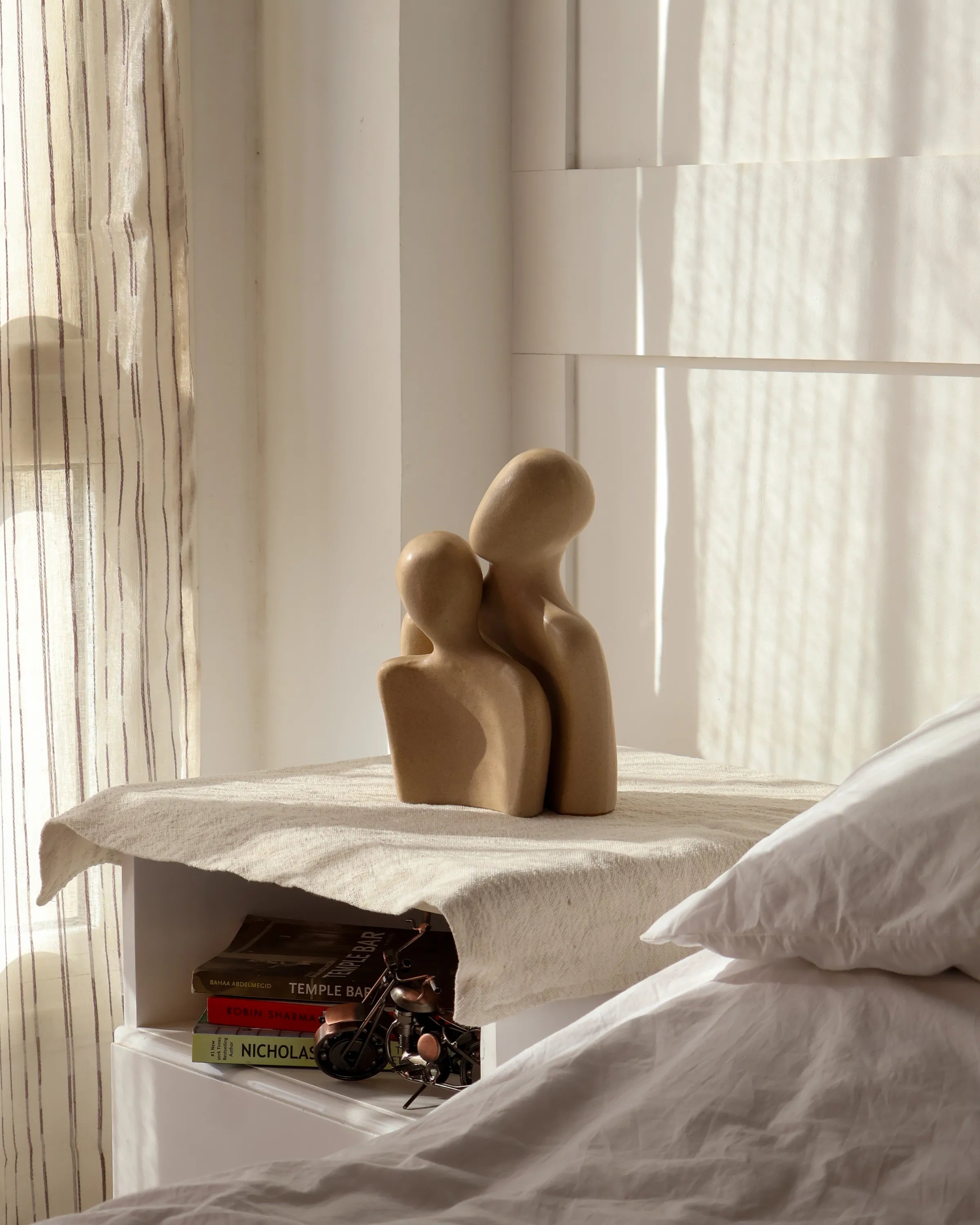 Handcrafted Soulmates decor piece in beige finish by Stonia.