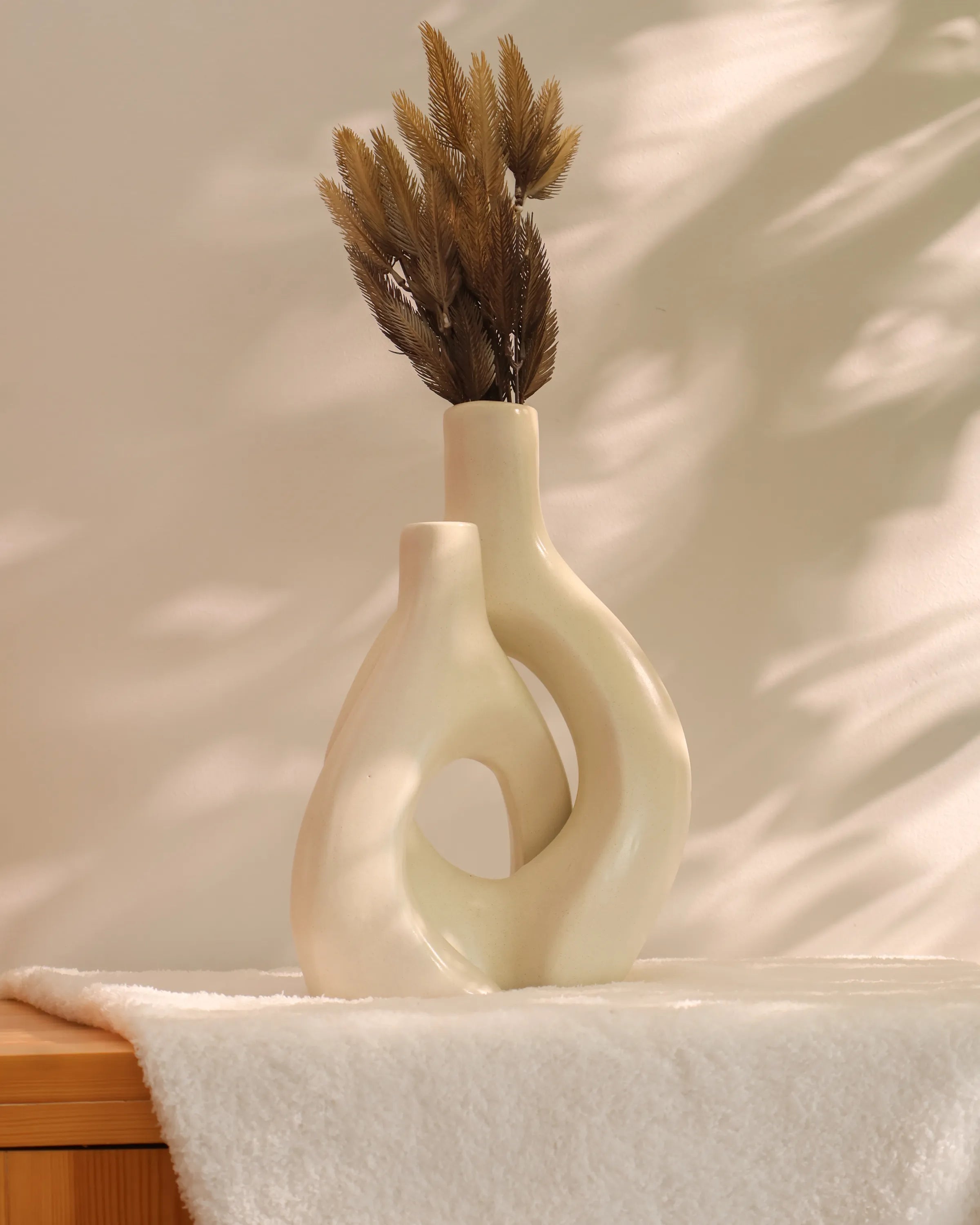 Handcrafted Tango decor piece in off white finish by Stonia.