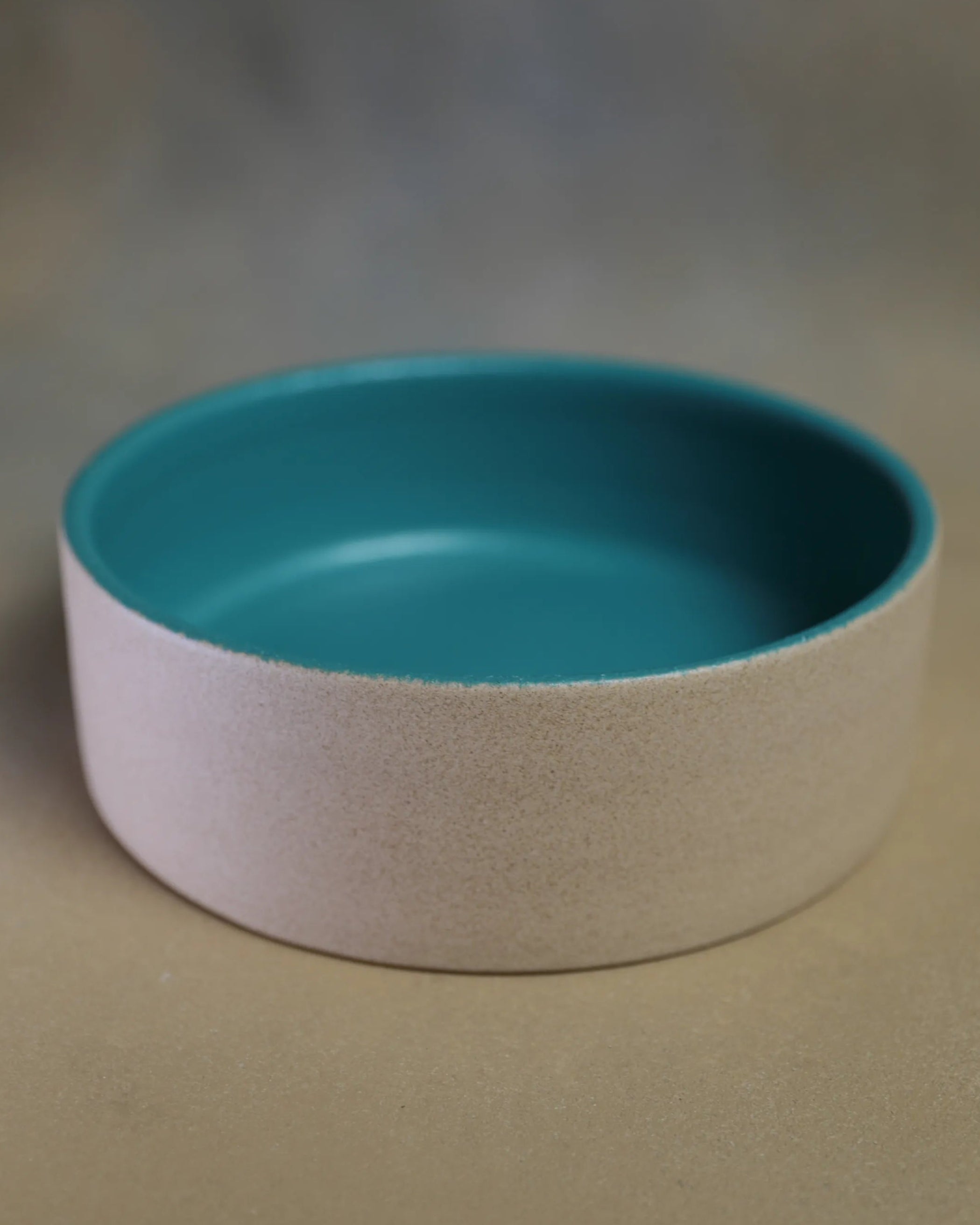 Handcrafted Wanas Bowl in beige and oasis by Stonia.