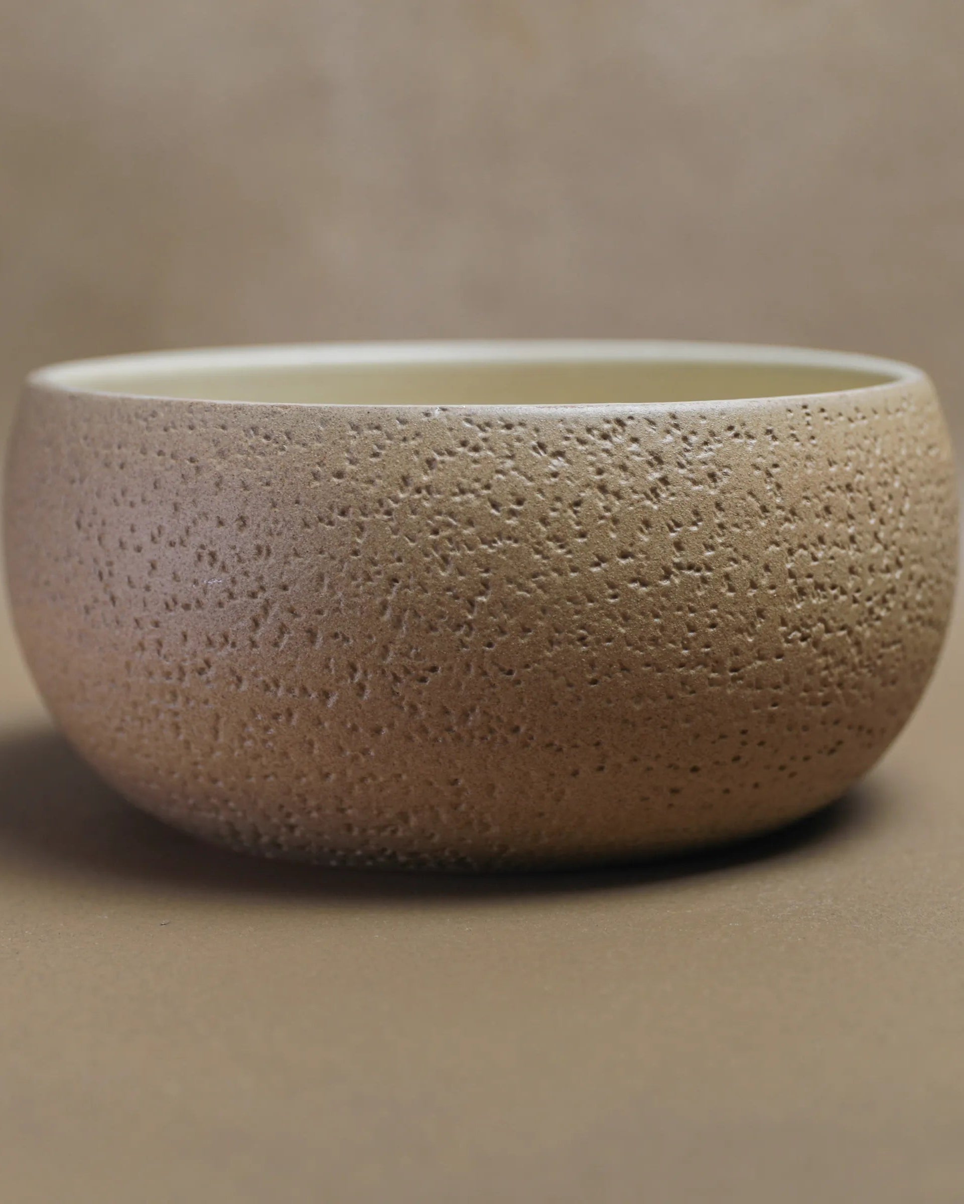 Handcrafted CRUSTY BOWL in beige by Stonia.