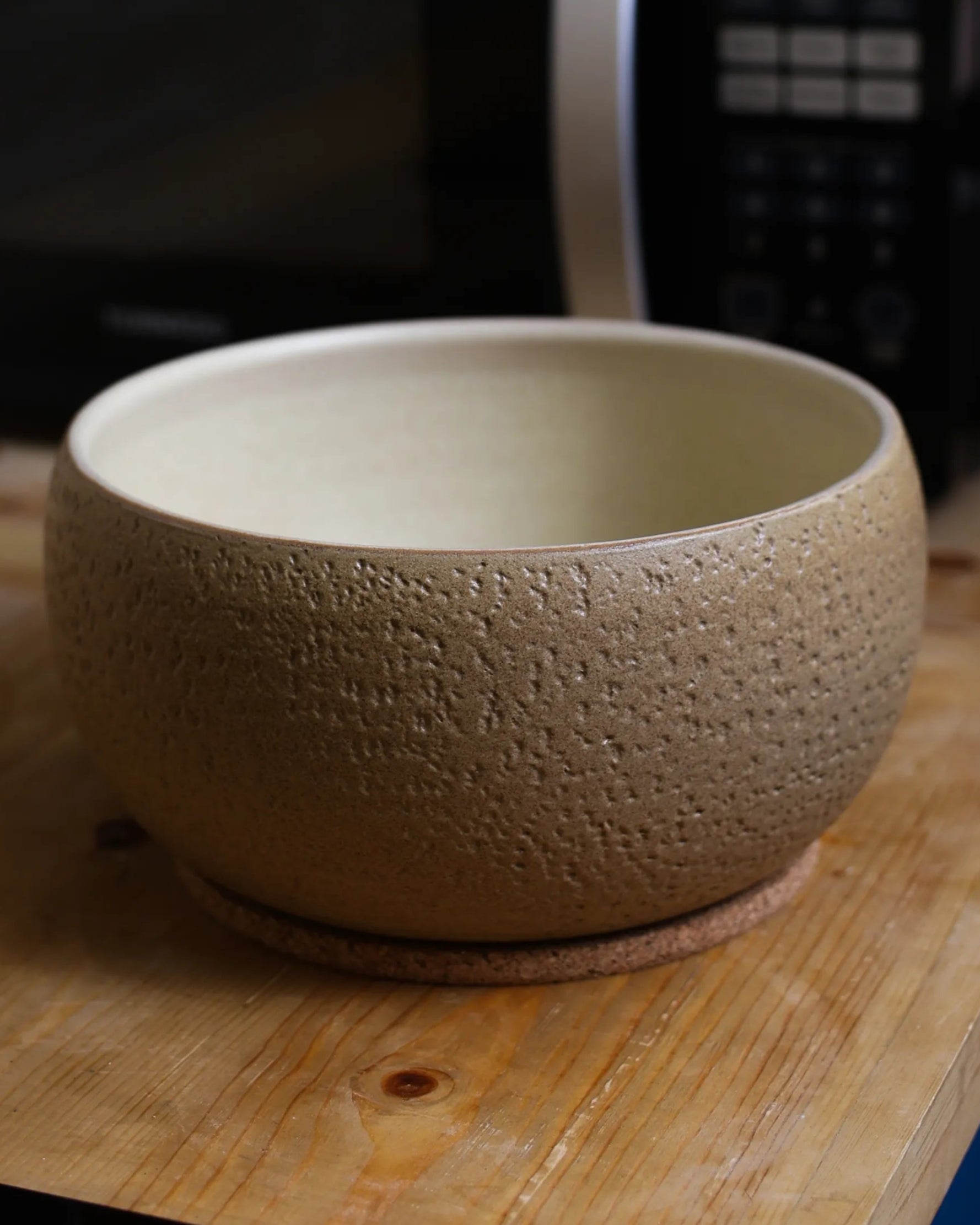 Handcrafted CRUSTY BOWL in beige by Stonia.