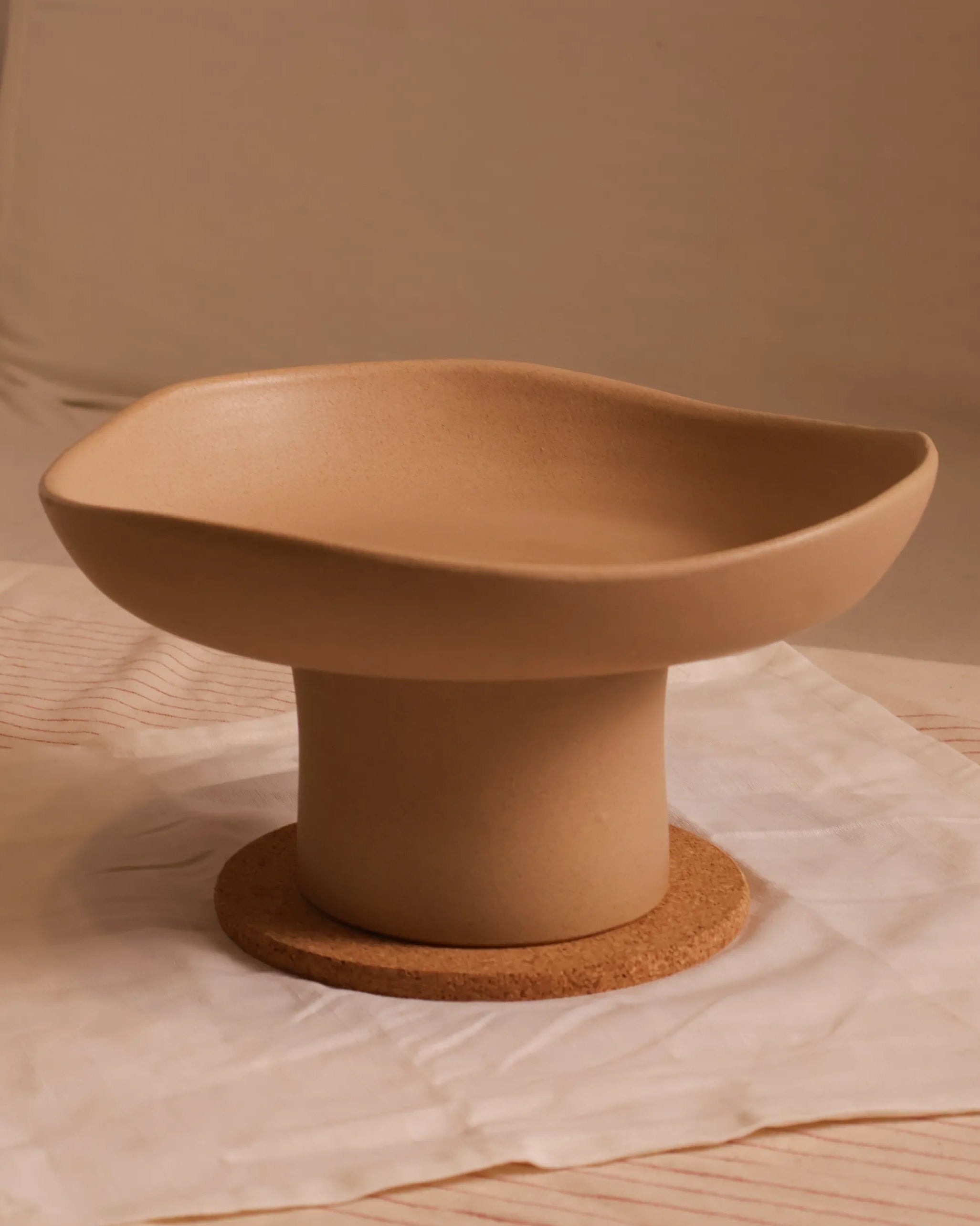 Handcrafted FLORA serving plate in beige finish by Stonia.