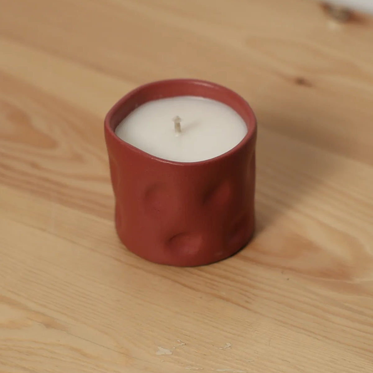 Handcrafted Melty Candle in terracotta finish by Stonia.