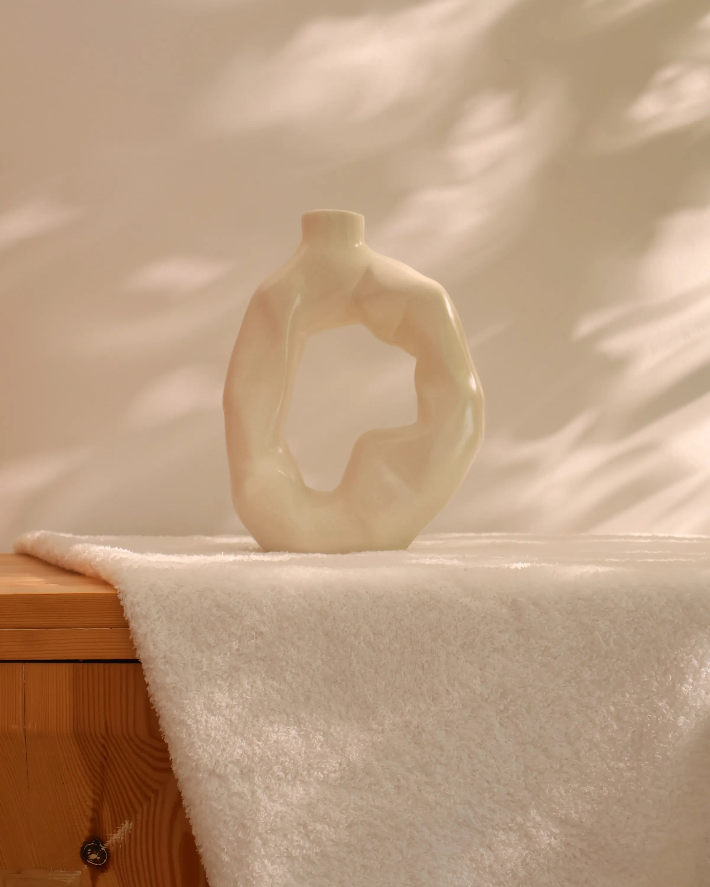 Handcrafted Ora decor piece in off white finish by Stonia.
