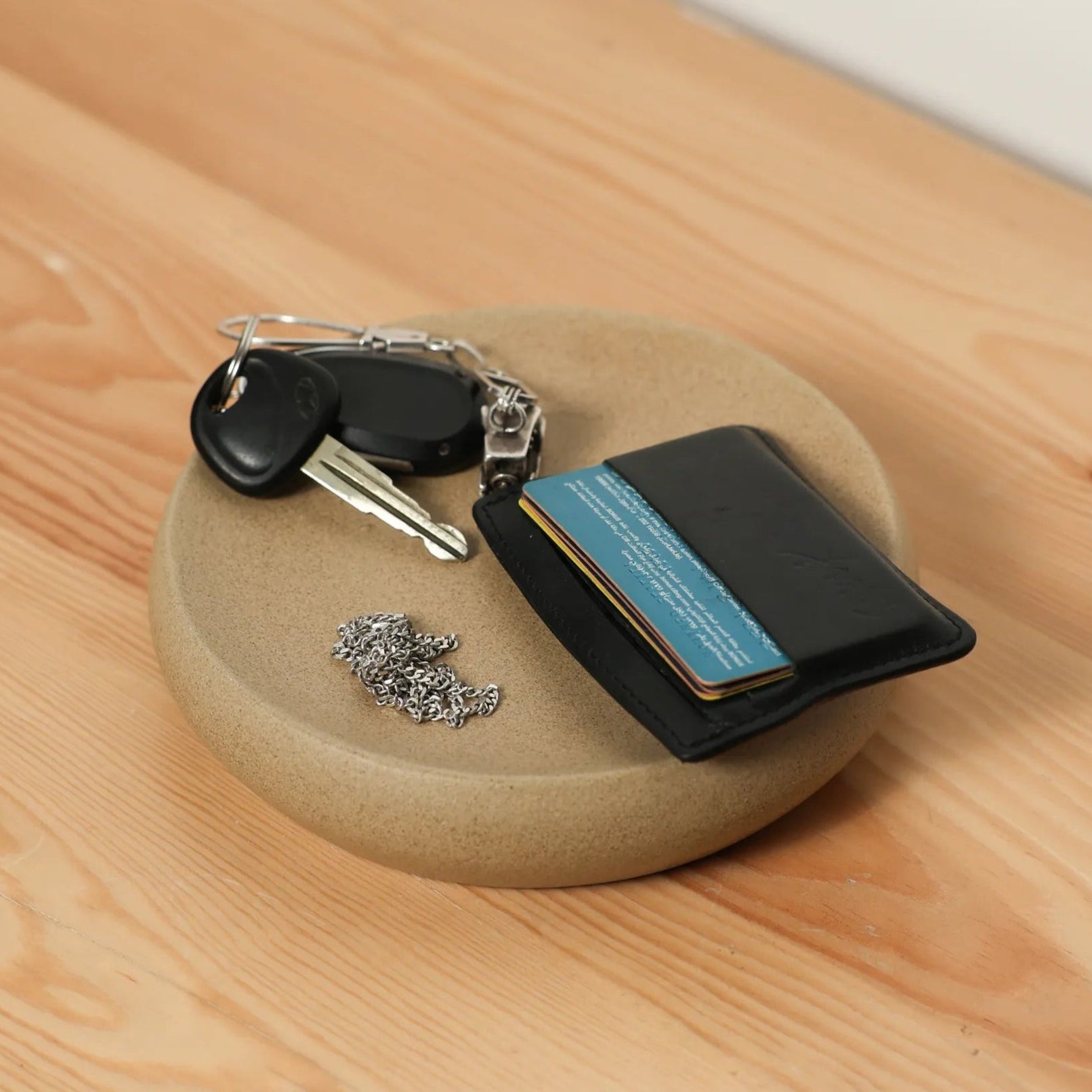 Handcrafted Pebble Tray accessory item in beige finish by Stonia.