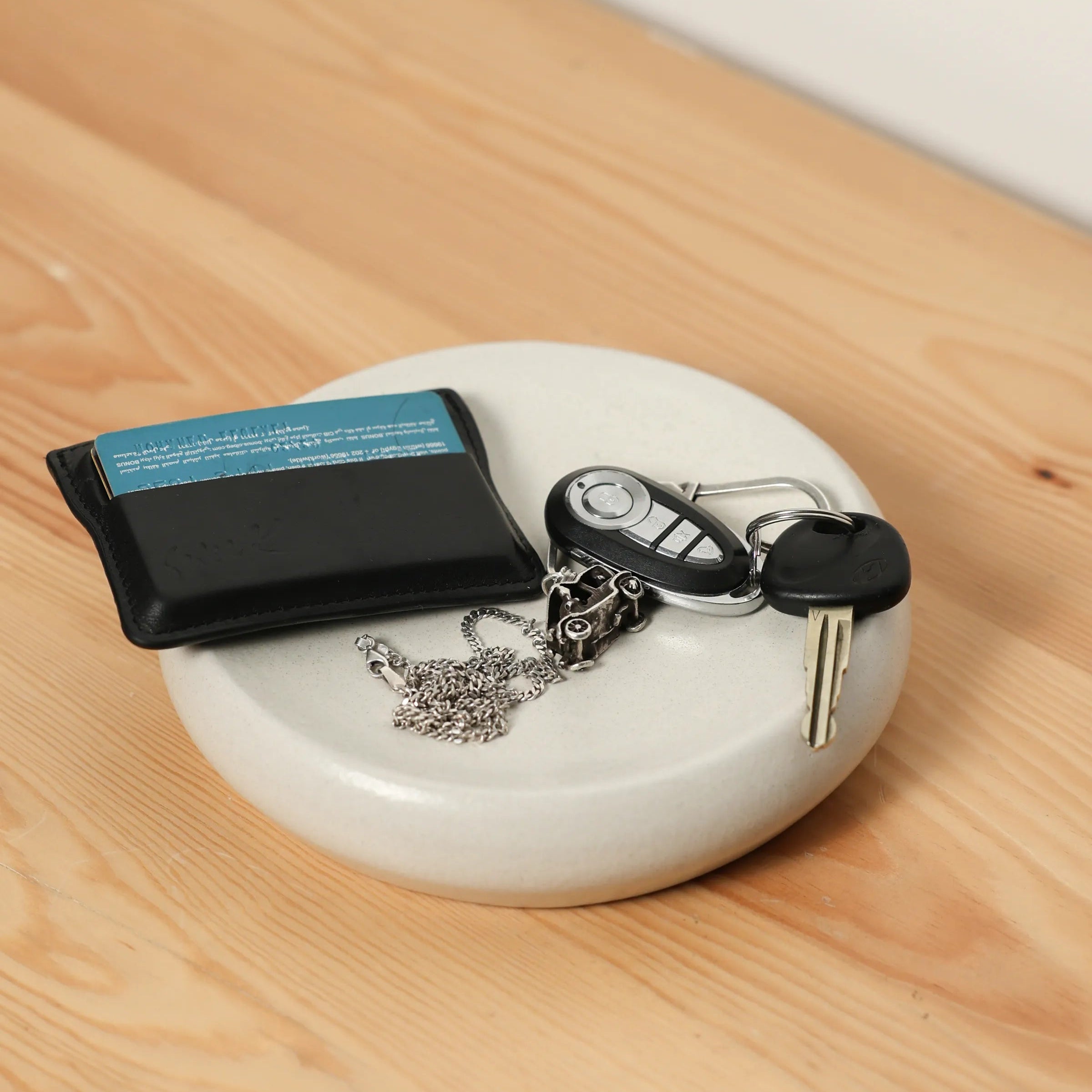 Handcrafted Pebble Tray accessory item in white finish by Stonia.