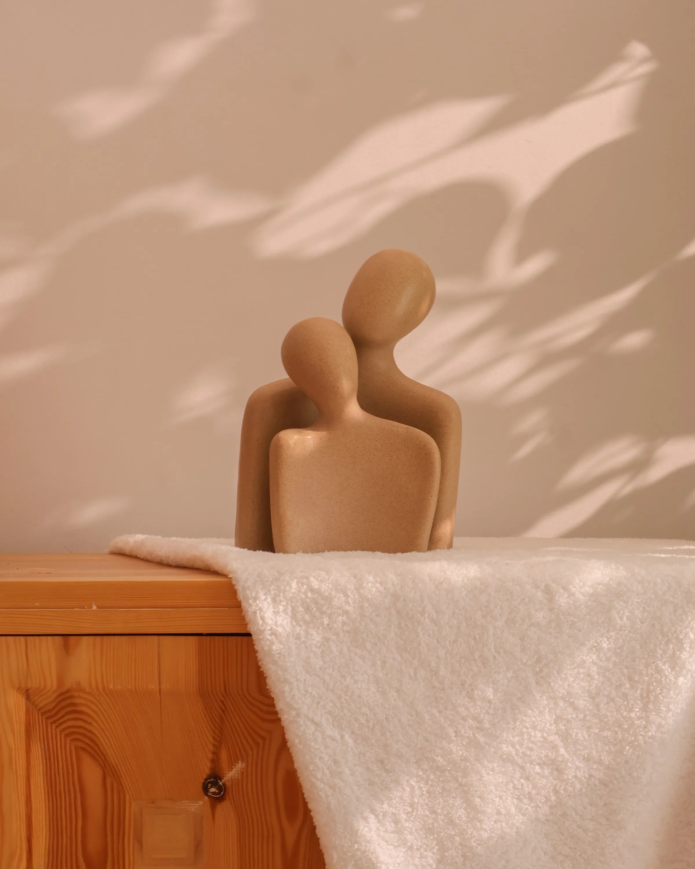 Handcrafted Soulmates decor piece in beige finish by Stonia.